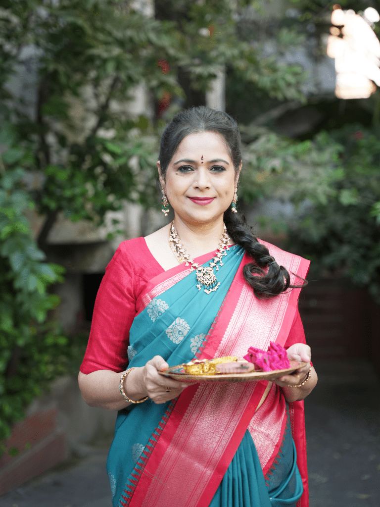 Gadwal pattu saree peacock blue color allover zari motifs & zari border with contrast pallu and blouse