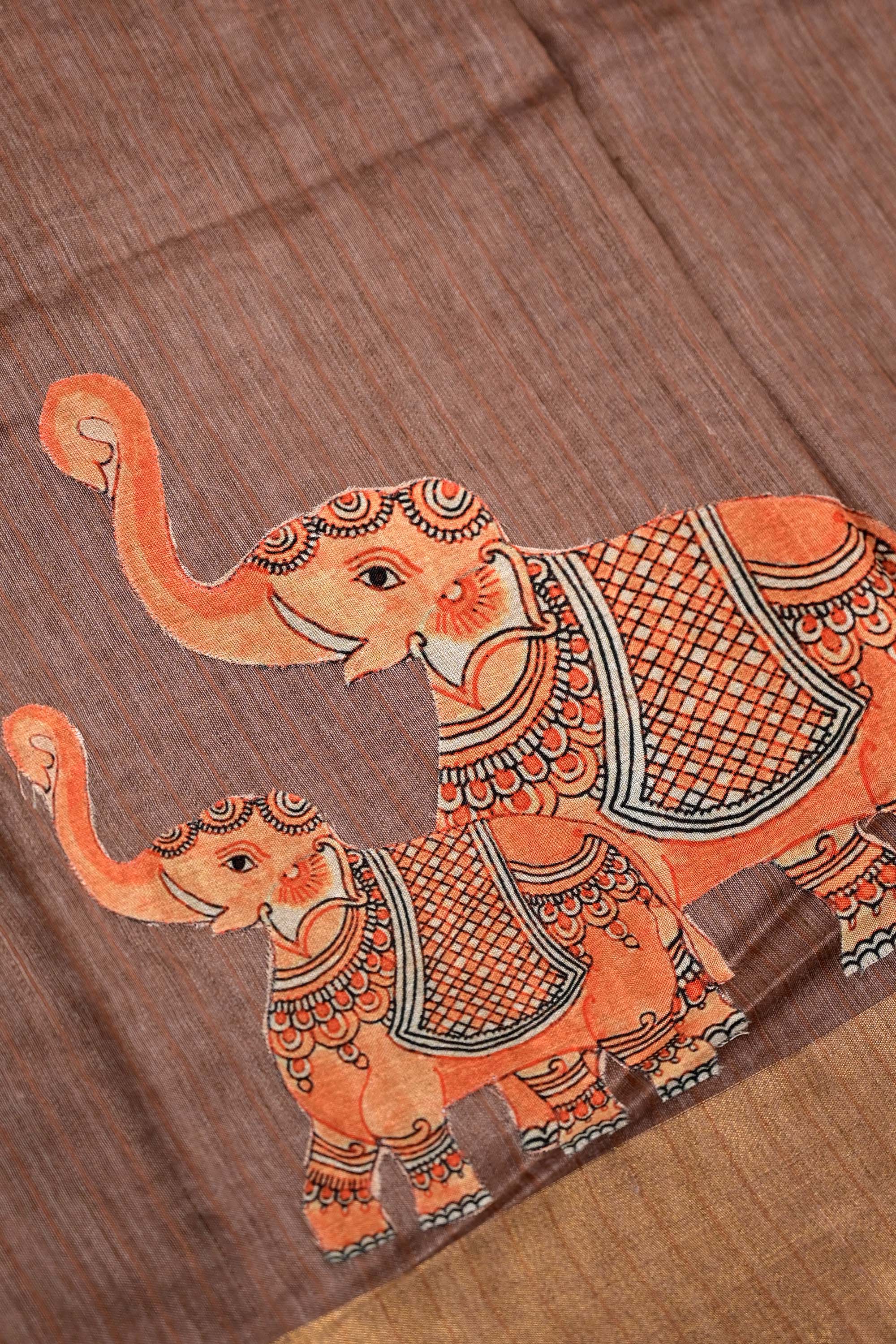 Tussar jute saree brown color with kalamkari prints, big printed pallu, small kaddi border and printed blouse