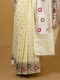 Banaras pattu fancy saree in cream color allover zari motifs and paithani border paired with plain blouse
