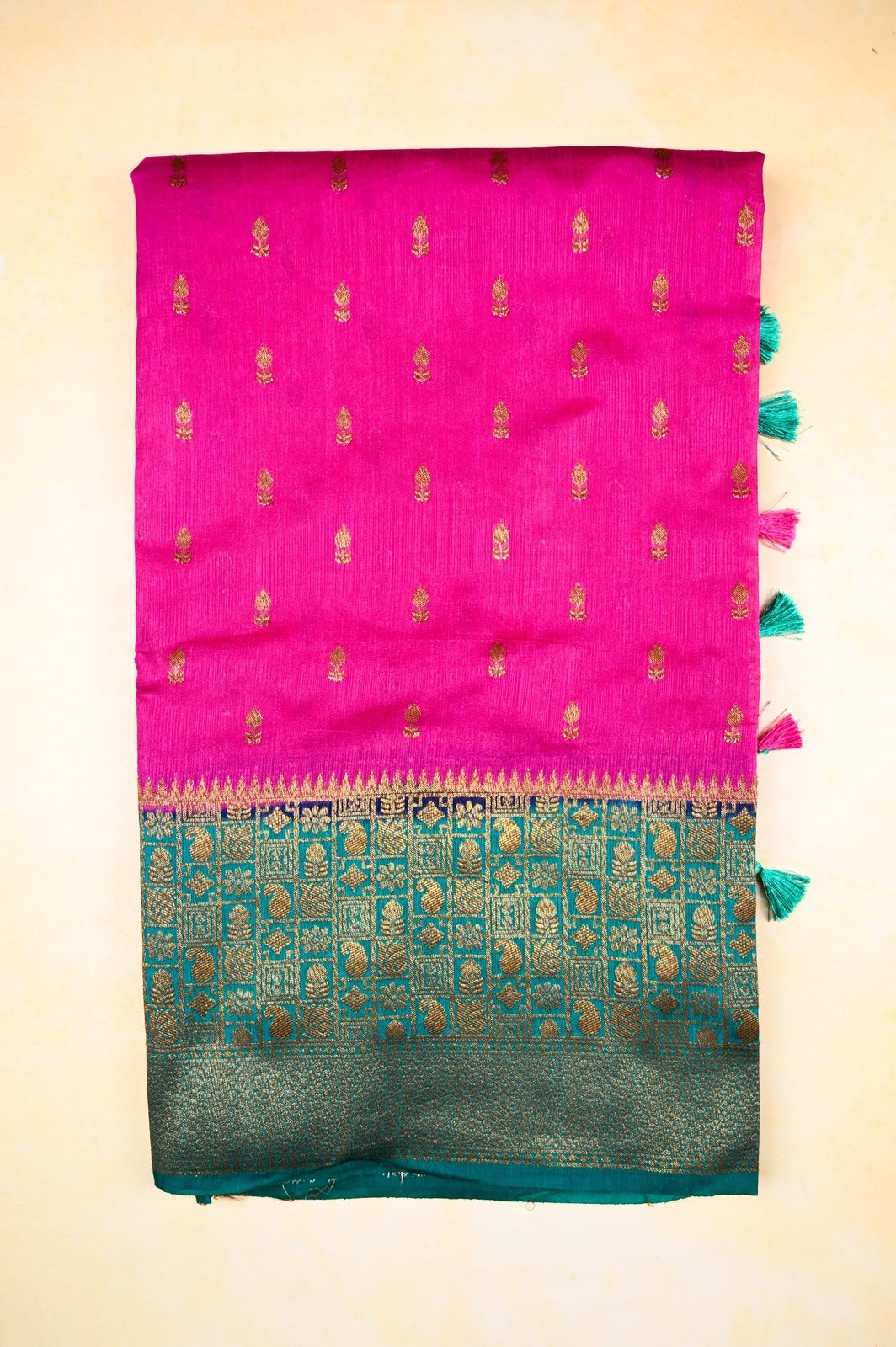 Jute silk saree dark pink and green color with allover zari motive weaves, big border, contrast pallu and plain blouse