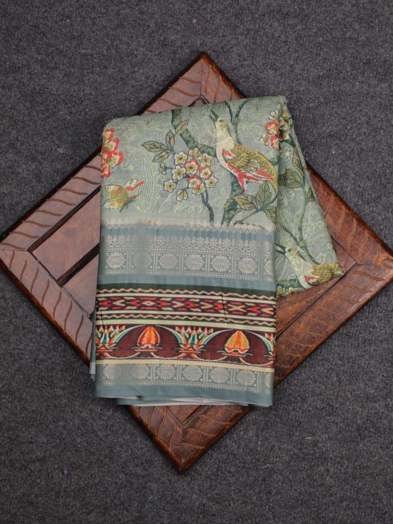 Silk kota fancy saree sea green color with allover digital prints & printed and zari border with short pallu and printed blouse