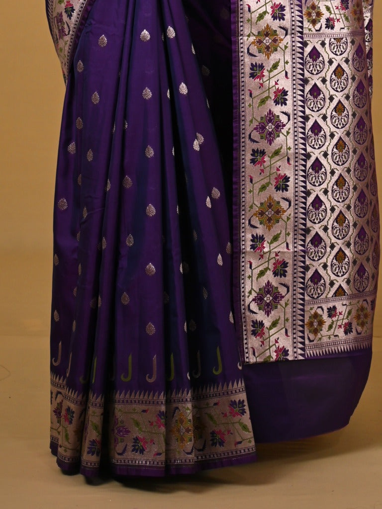 Banaras pattu fancy saree in blue color allover zari motifs and paithani border paired with plain blouse