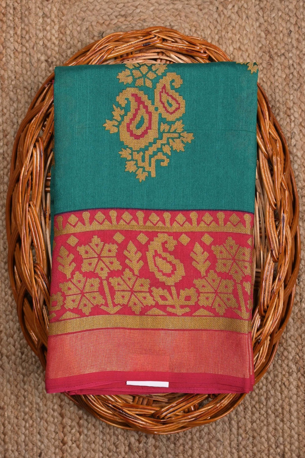 Soft jute saree green and red color allover prints with contrast border and brocade blouse