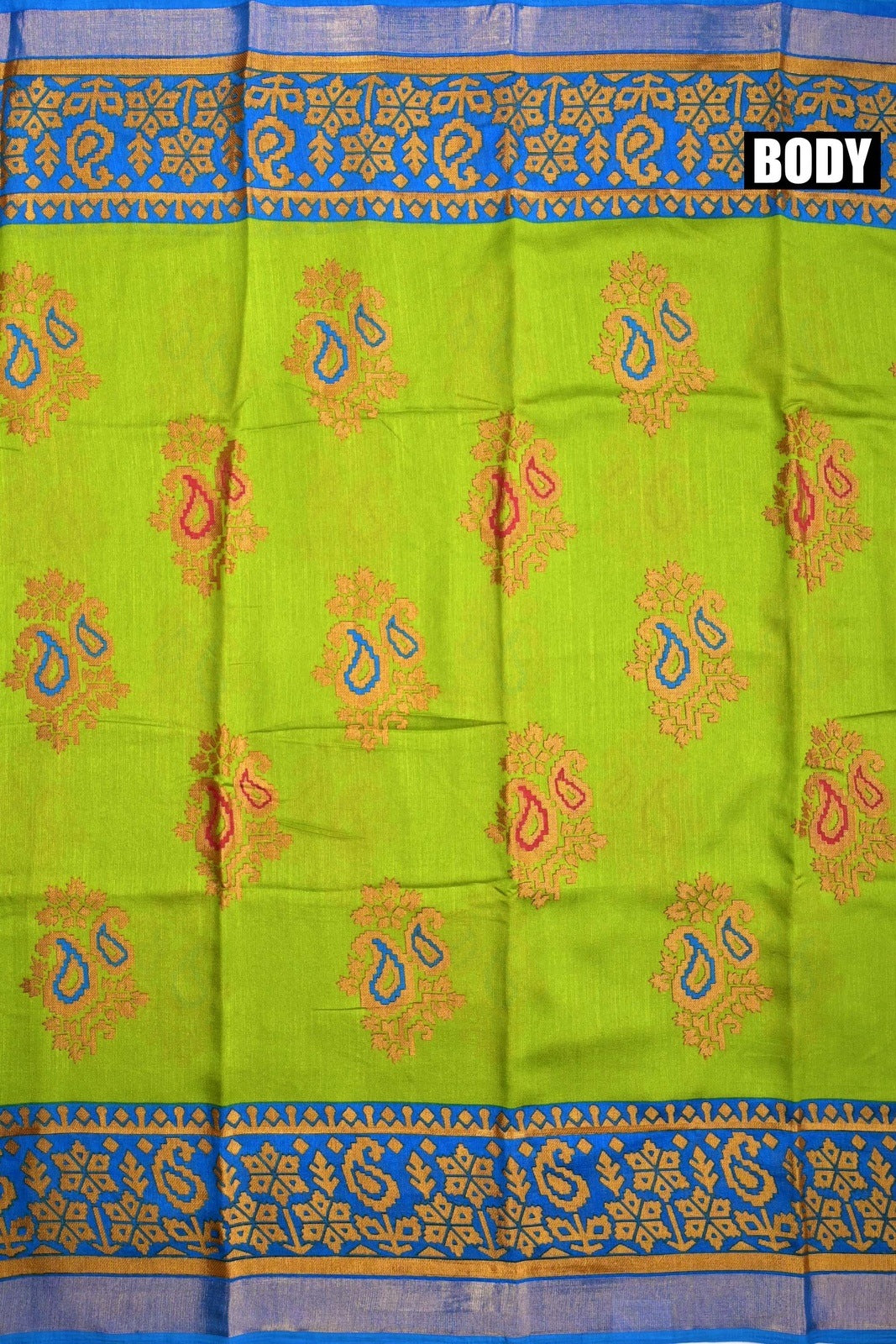 Soft jute saree green and blue color allover prints with contrast border and brocade blouse