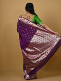 Banaras pattu fancy saree in violet color allover zari motifs and paithani border paired with plain blouse