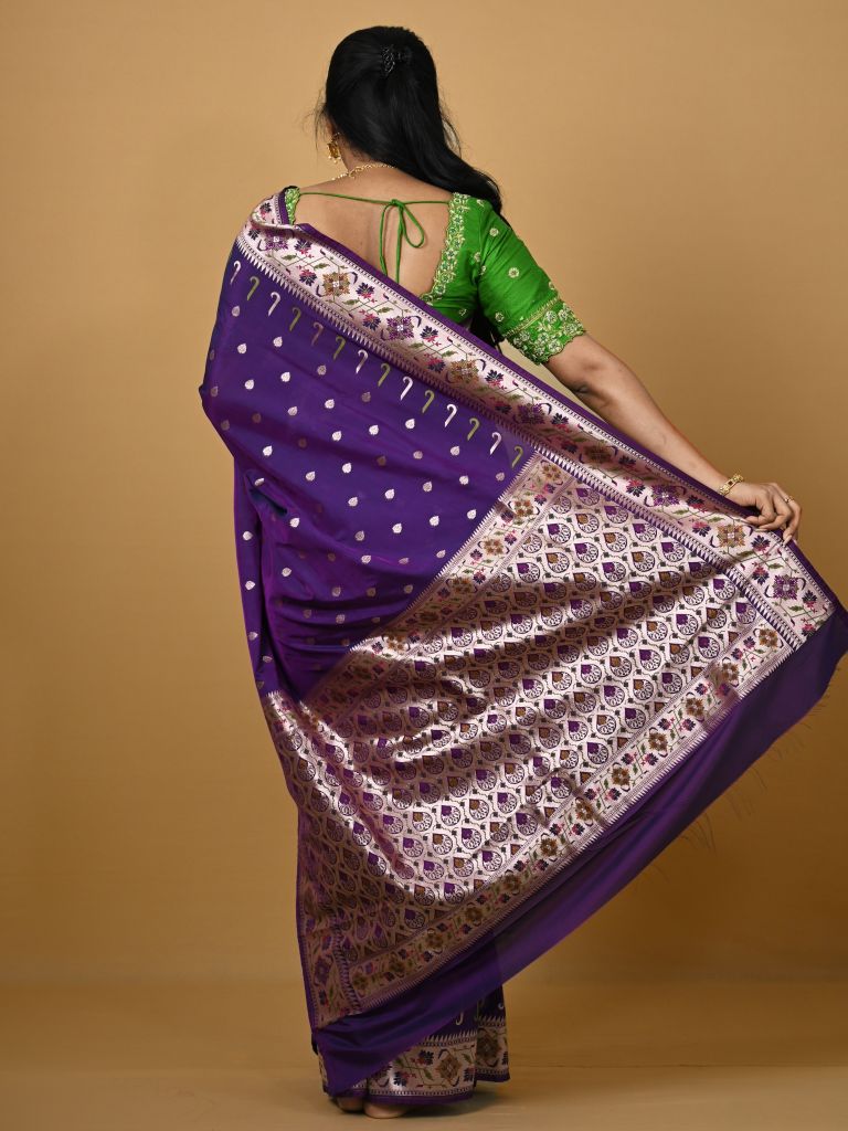 Banaras pattu fancy saree in blue color allover zari motifs and paithani border paired with plain blouse