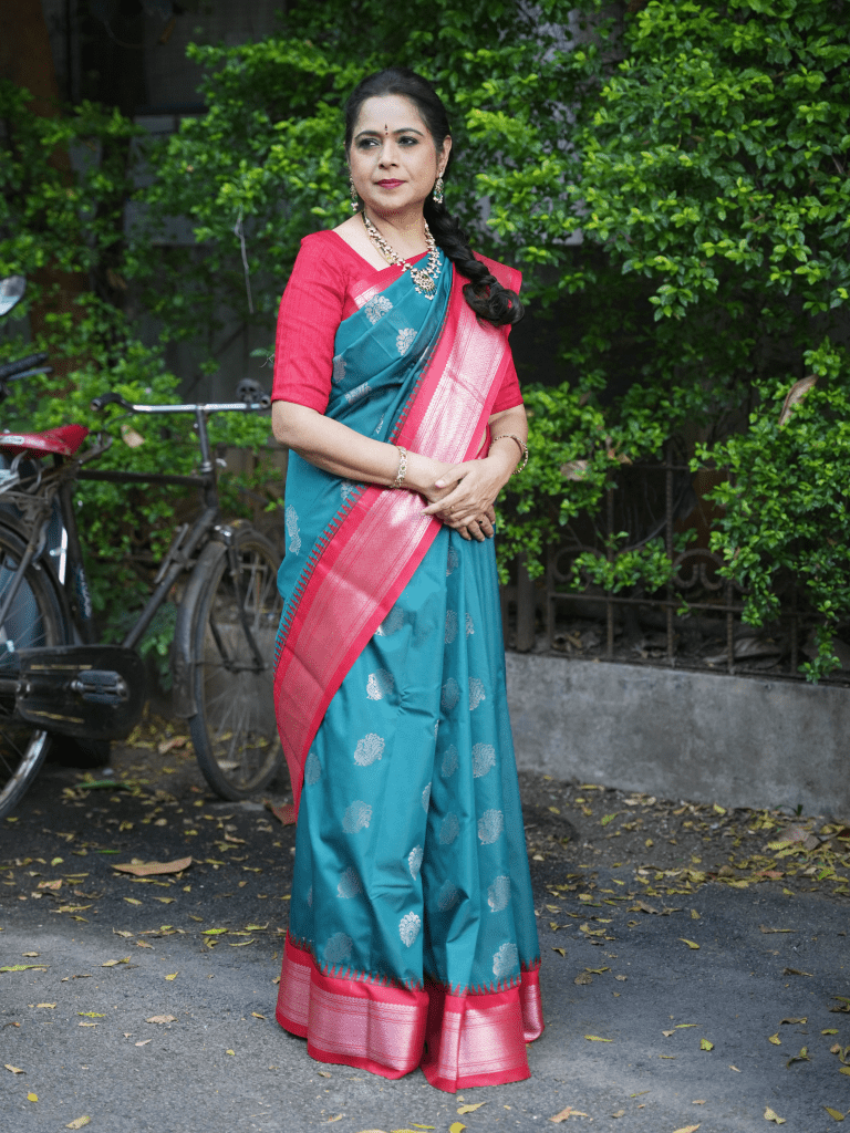 Gadwal pattu saree peacock blue color allover zari motifs & zari border with contrast pallu and blouse