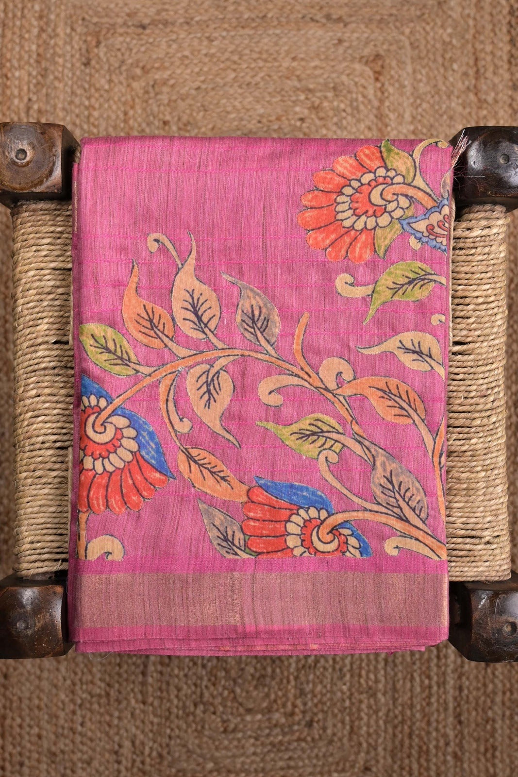 Tussar jute saree light pink color with kalamkari prints, big printed pallu, small kaddi border and printed blouse