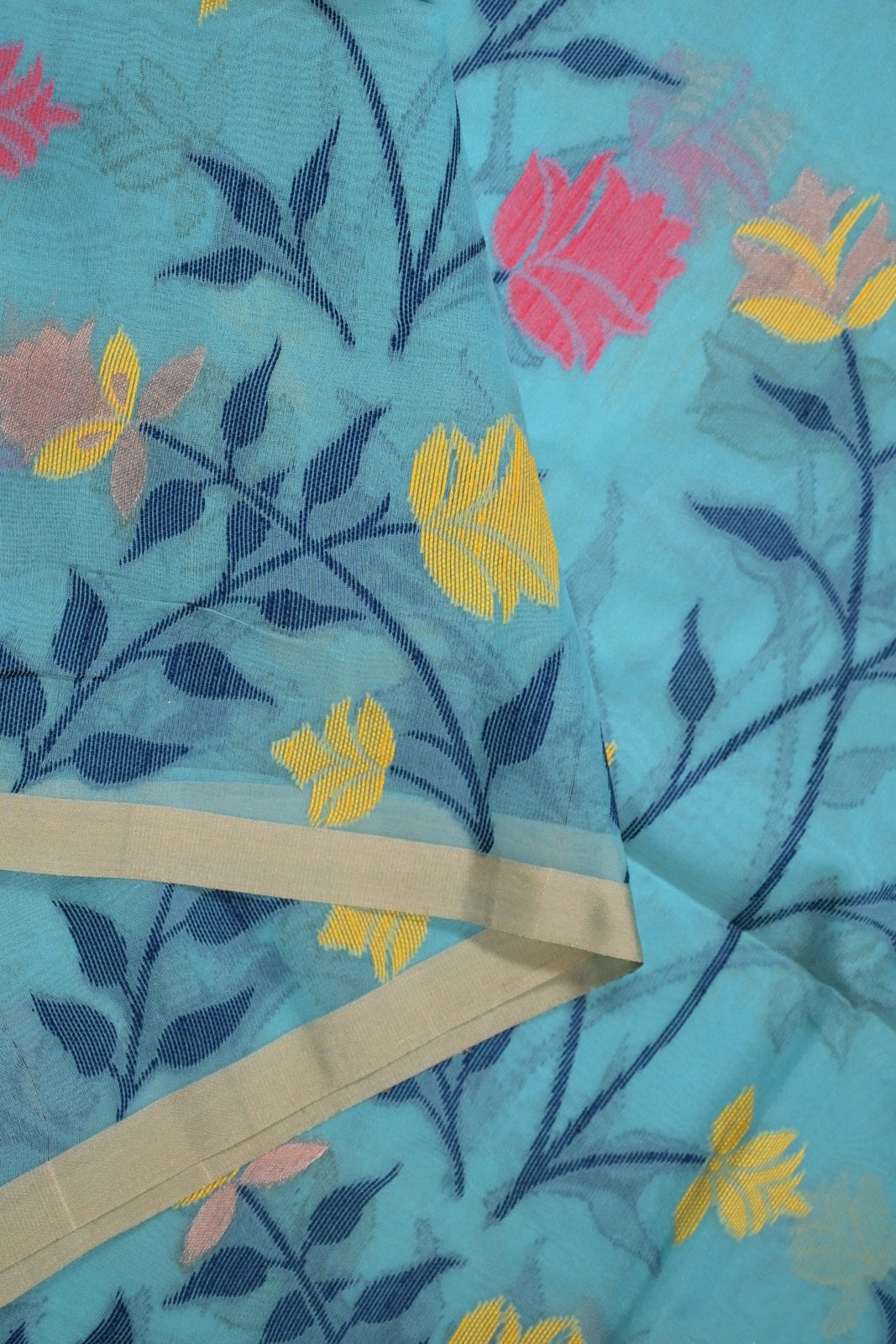 Muslin silk saree light blue with allover thread embroidery, small border, and plain blouse