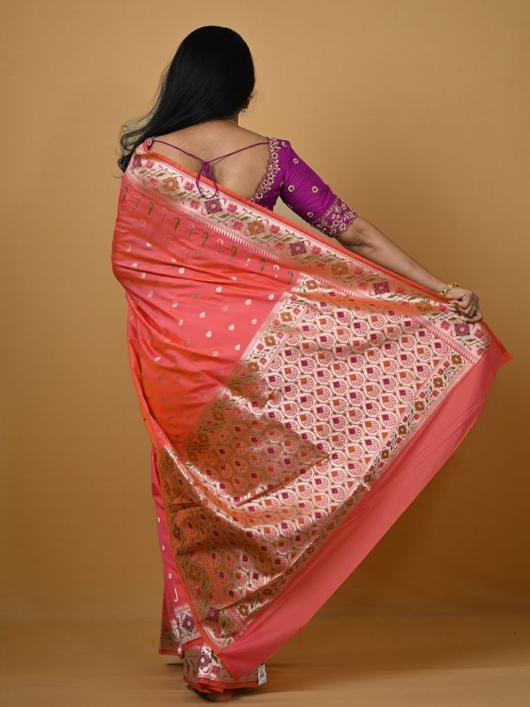 Banaras pattu fancy saree in pink color allover zari motifs and paithani border paired with plain blouse