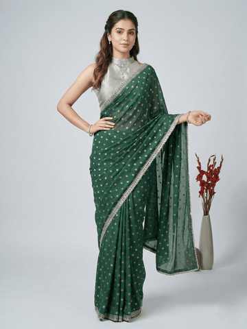 Chinnon fancy saree dark green color allover motifs & embroidery border with running pallu and contrast blouse