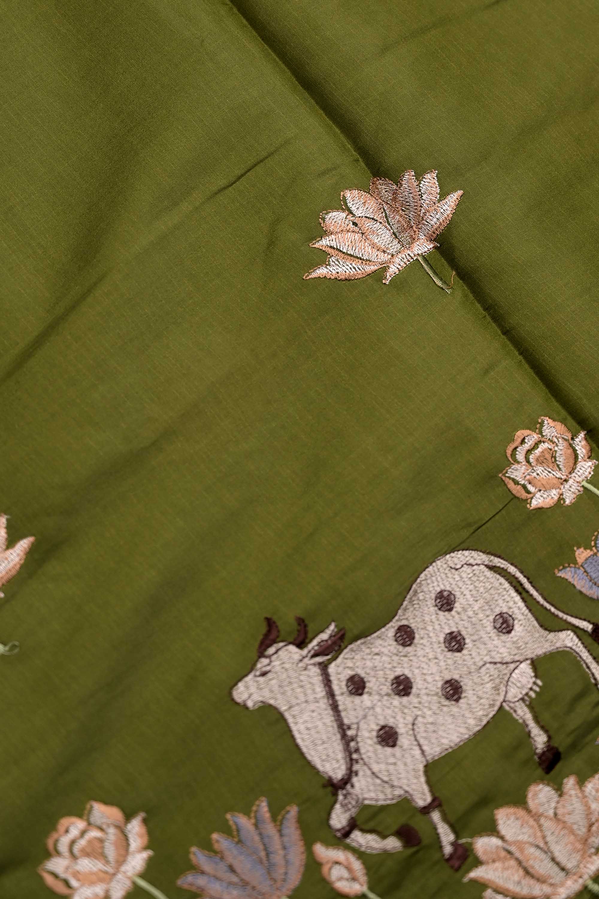 Tussar fancy saree olive green color allover thread weaving with self pallu and attached plain blouse