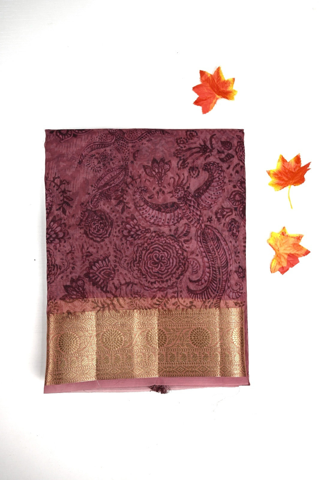 Organza Saree pink color with allover prints, small gold zari border, short pallu and plain blouse