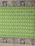 Kalamakari cotton saree parrot green color allover prints & printed border with printed pallu and contrast blouse