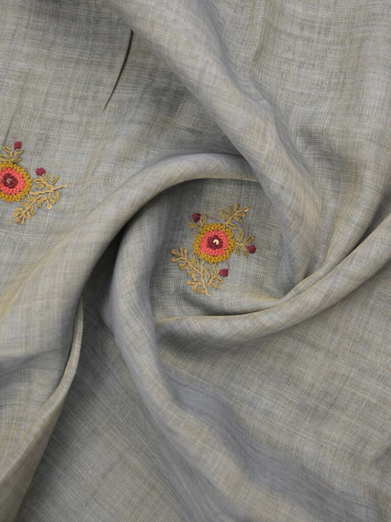 Lenin tissue embroidered fancy saree in light grey color with embroidery pallu and matching blouse