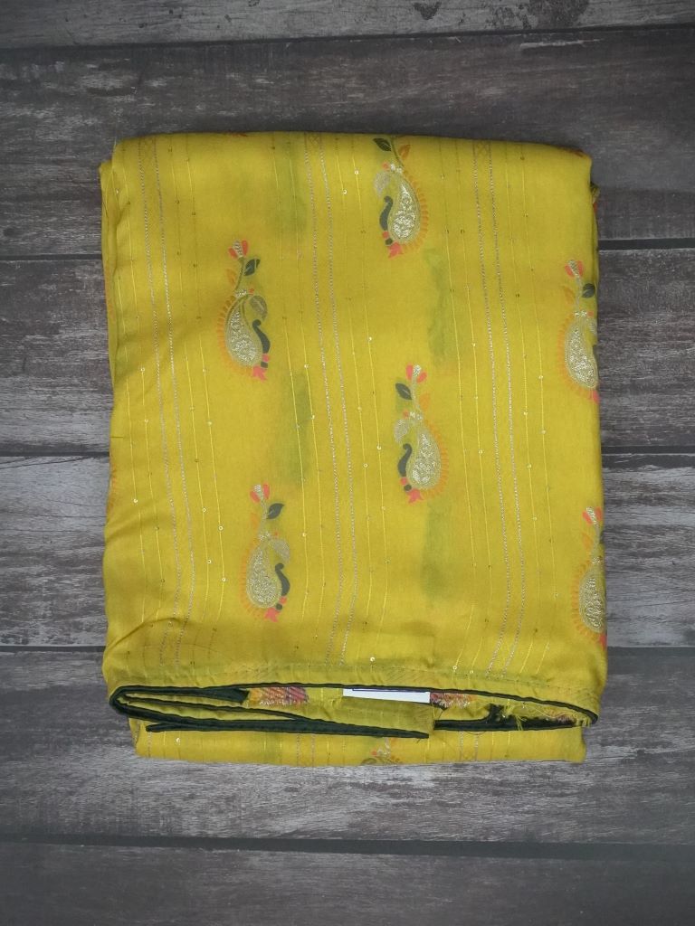 Dola silk fancy saree yellow color with allover zari and sequence lines with motives, running pallu and contrast blouse.