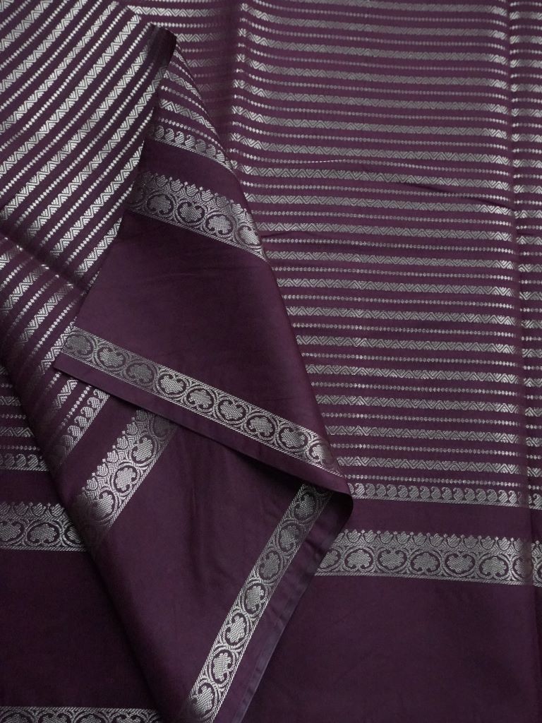 Banaras fancy saree wine color with allover zari stripes, gap border with brocade pallu and attached blouse