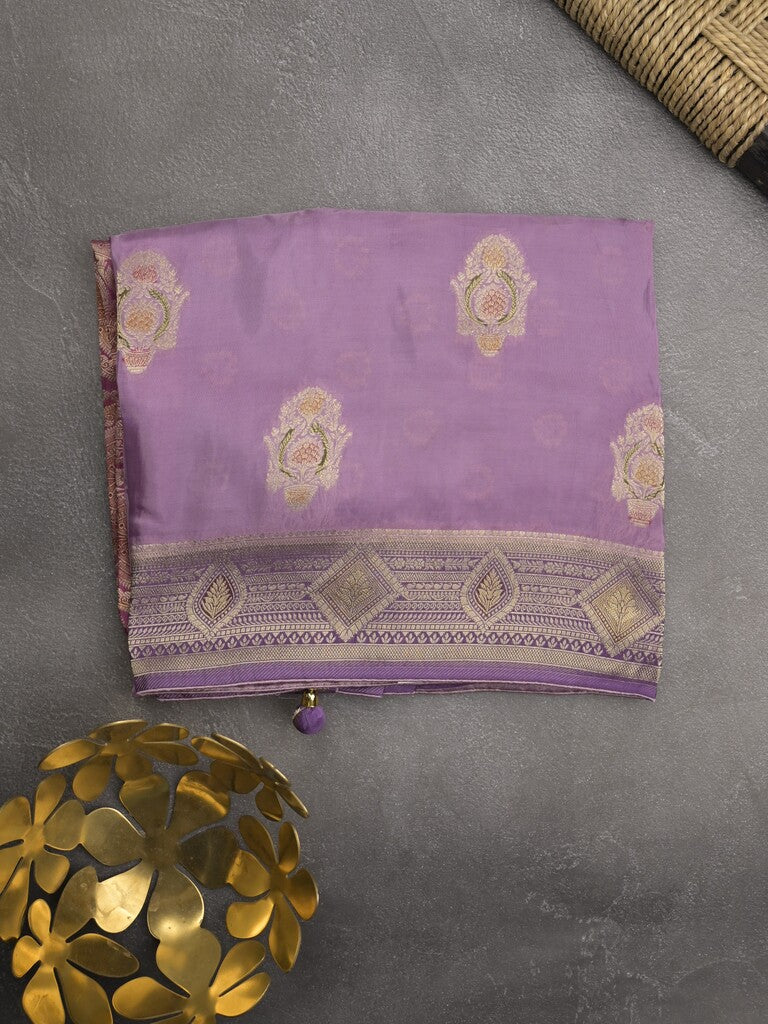 Dola silk fancy saree lavender color allover prints & zari border with printed pallu and attached blouse
