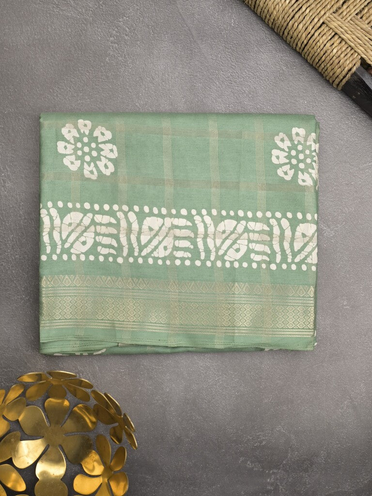 Dola silk fancy saree light green color allover prints & zari border with printed pallu and attached blouse