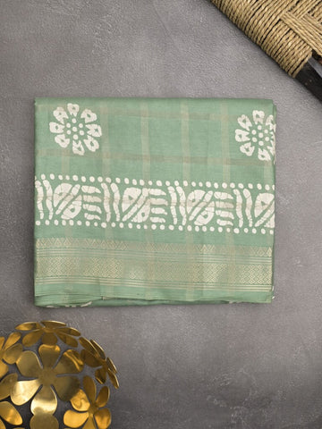 Dola silk fancy saree light green color allover prints & zari border with printed pallu and attached blouse