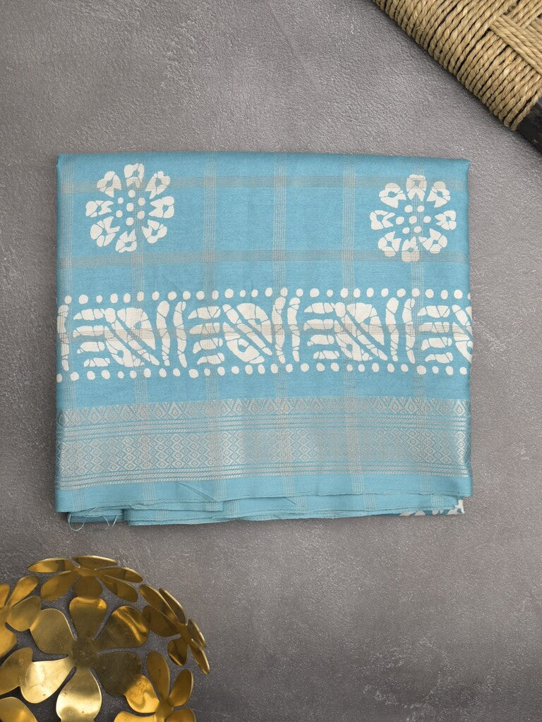 Dola silk fancy saree sky blue color allover prints & zari border with printed pallu and attached blouse