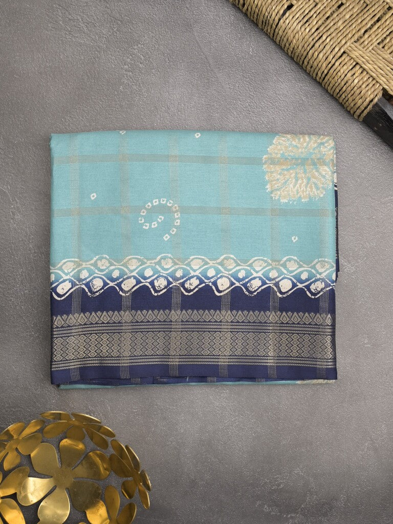 Dola silk fancy saree sky blue color allover prints & zari border with printed pallu and attached blouse