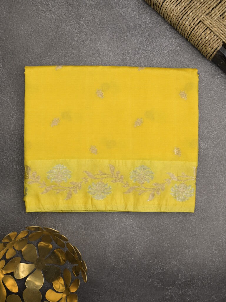 Raw mango fancy saree yellow color allover zari motifs & zari border with rich pallu and attached blouse