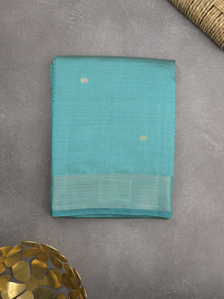 Dupion fancy saree sky blue color allover zari motifs & zari border with short pallu and attached blouse
