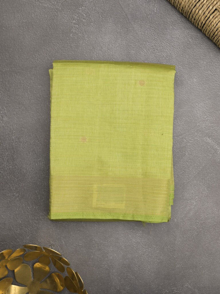 Dupion fancy saree light parrot green color allover zari motifs & zari border with short pallu and attached blouse