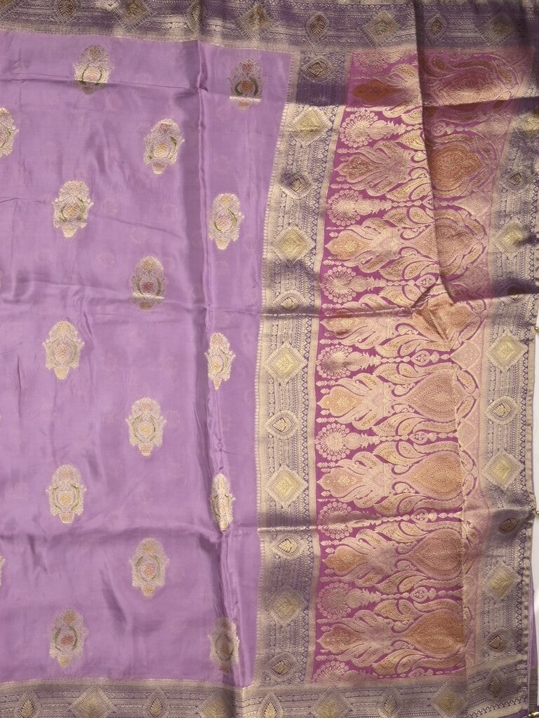 Dola silk fancy saree lavender color allover prints & zari border with printed pallu and attached blouse
