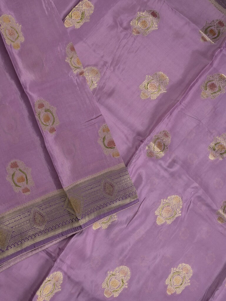 Dola silk fancy saree lavender color allover prints & zari border with printed pallu and attached blouse