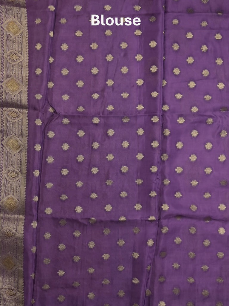 Dola silk fancy saree lavender color allover prints & zari border with printed pallu and attached blouse
