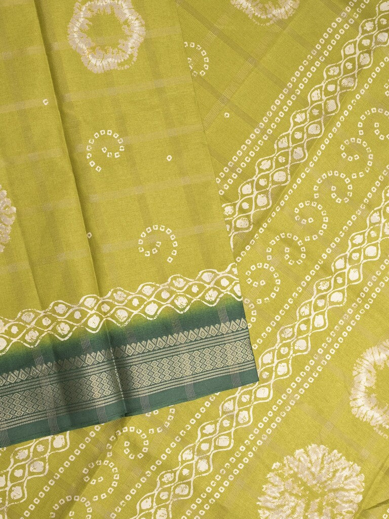 Dola silk fancy saree greenish yellow color allover prints & zari border with printed pallu and attached blouse