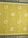 Dola silk fancy saree greenish yellow color allover prints & zari border with printed pallu and attached blouse