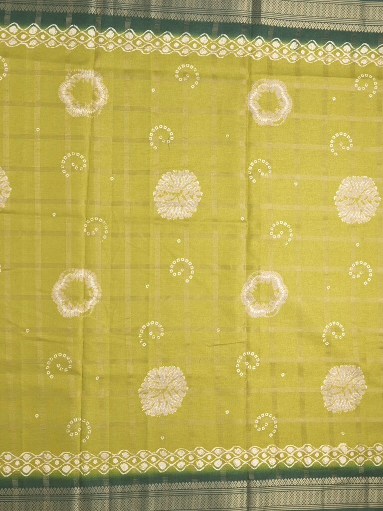 Dola silk fancy saree greenish yellow color allover prints & zari border with printed pallu and attached blouse