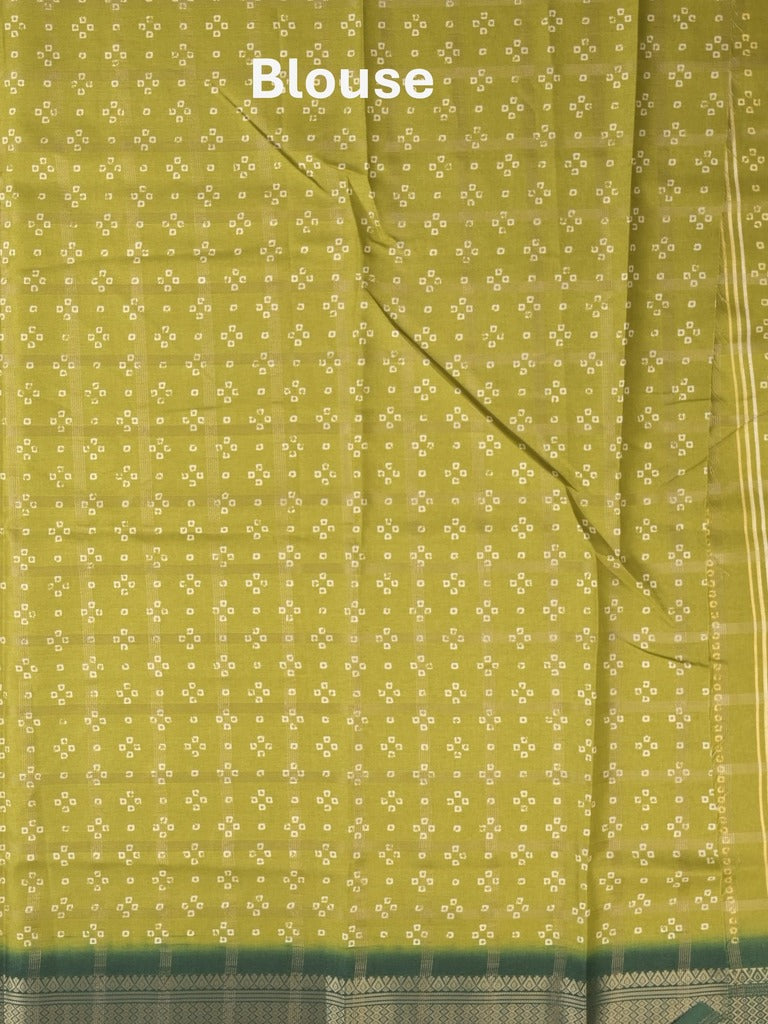 Dola silk fancy saree greenish yellow color allover prints & zari border with printed pallu and attached blouse