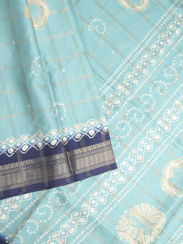 Dola silk fancy saree sky blue color allover prints & zari border with printed pallu and attached blouse