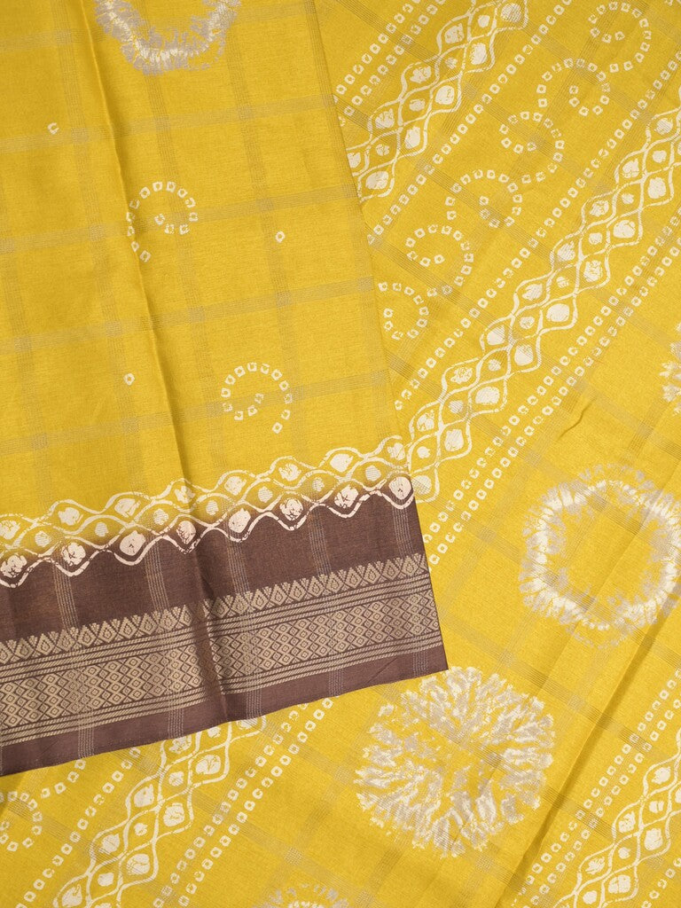 Dola silk fancy saree golden yellow color allover prints & zari border with printed pallu and attached blouse