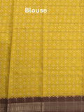 Dola silk fancy saree golden yellow color allover prints & zari border with printed pallu and attached blouse