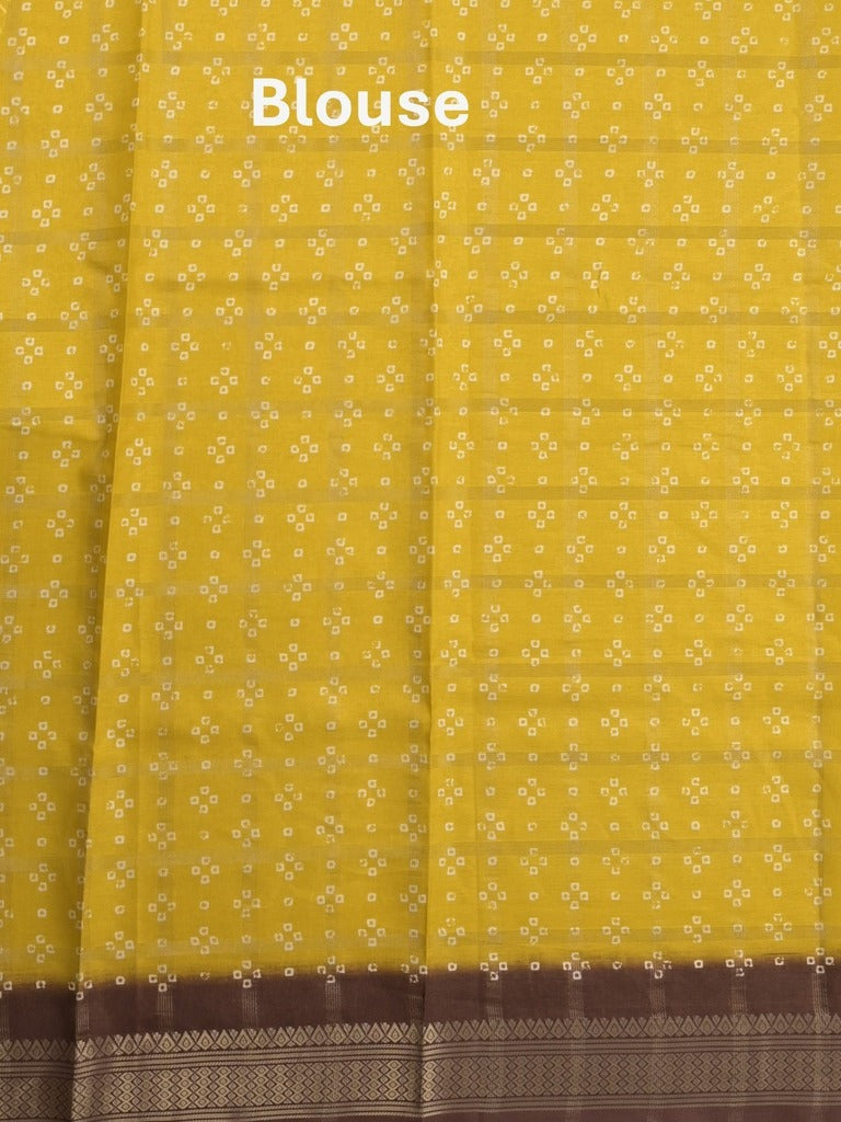 Dola silk fancy saree golden yellow color allover prints & zari border with printed pallu and attached blouse