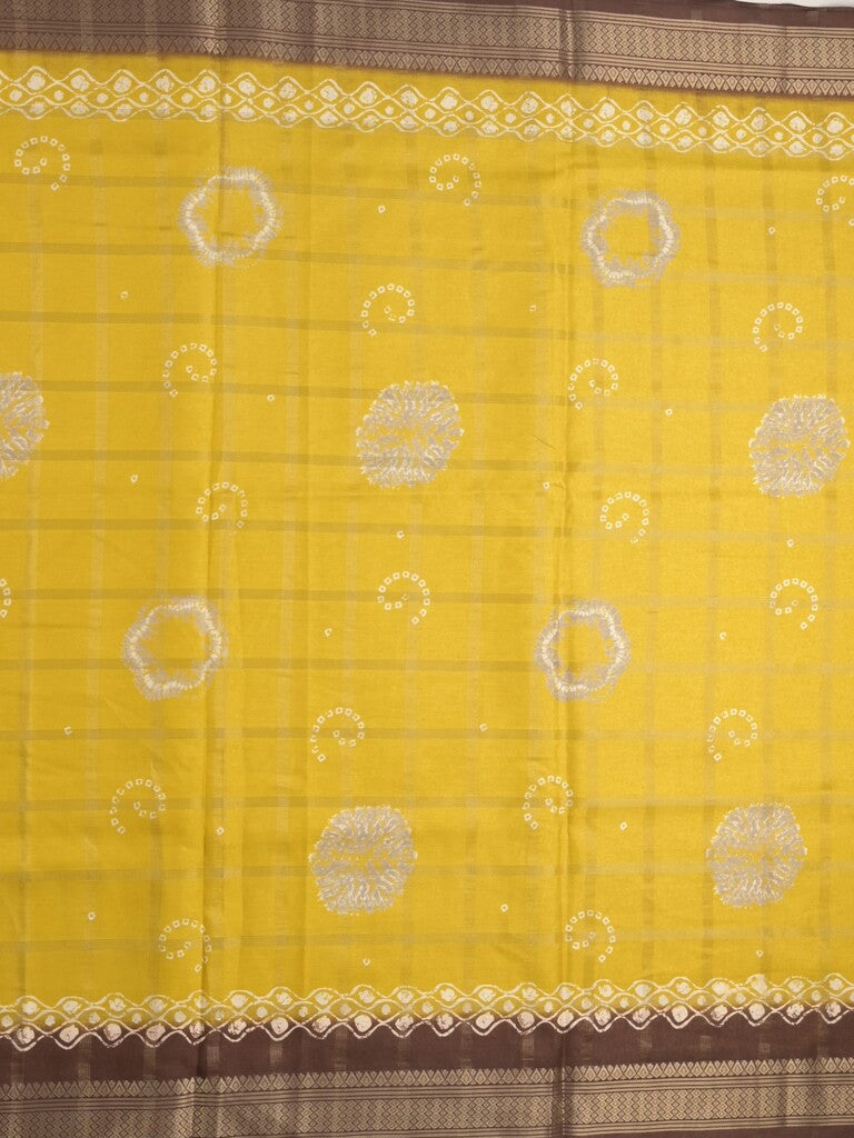 Dola silk fancy saree golden yellow color allover prints & zari border with printed pallu and attached blouse