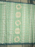 Dola silk fancy saree lux green color allover prints & zari border with printed pallu and attached blouse