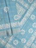 Dola silk fancy saree sky blue color allover prints & zari border with printed pallu and attached blouse