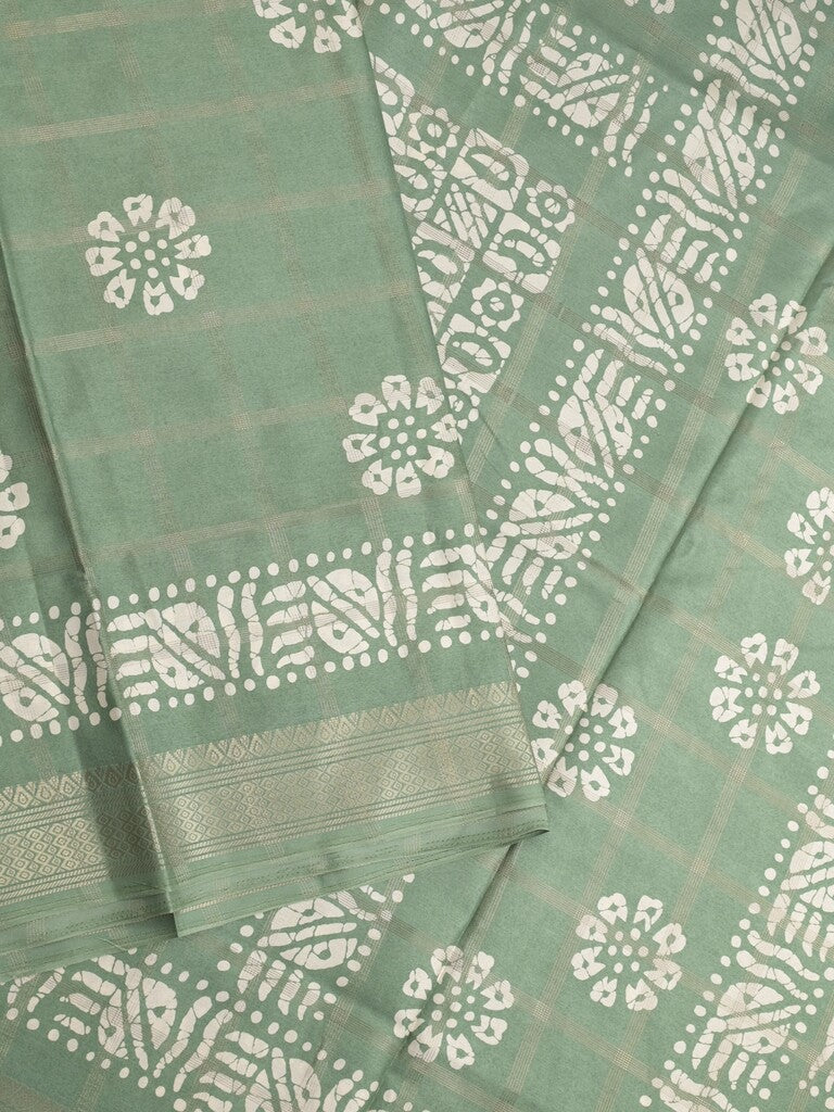 Dola silk fancy saree light green color allover prints & zari border with printed pallu and attached blouse