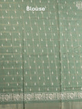 Dola silk fancy saree light green color allover prints & zari border with printed pallu and attached blouse