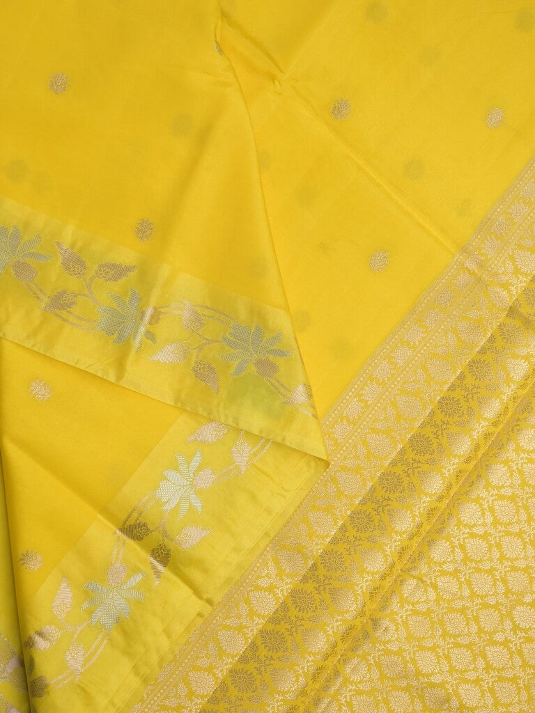 Raw mango fancy saree yellow color allover zari motifs & zari border with rich pallu and attached blouse