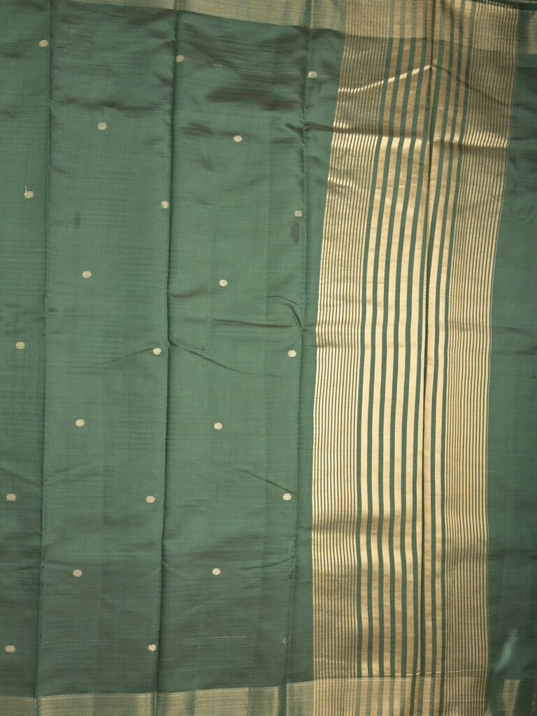 Dupion fancy saree bottle green color allover zari motifs & zari border with short pallu and attached blouse