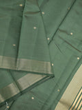Dupion fancy saree bottle green color allover zari motifs & zari border with short pallu and attached blouse