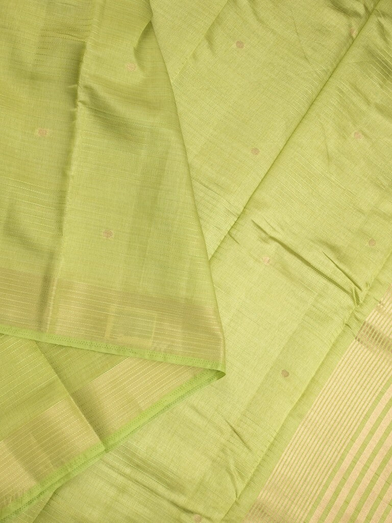 Dupion fancy saree light parrot green color allover zari motifs & zari border with short pallu and attached blouse