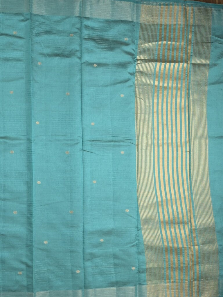 Dupion fancy saree sky blue color allover zari motifs & zari border with short pallu and attached blouse